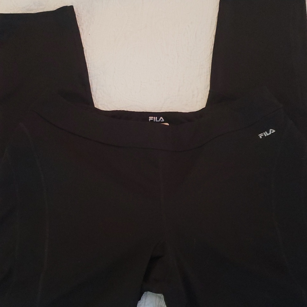 Fila polyester and spandex women's yoga pants. With key pocket on waist in back.